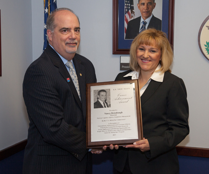Left to right:  U.S. AbilityOne Commission Chairperson J. Anthony Poleo with Recipient Nancy Heimbaugh